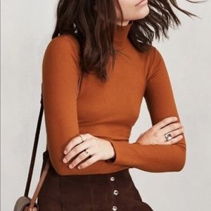 Orange turtle neck
